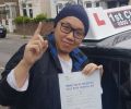 Doung with Driving test pass certificate